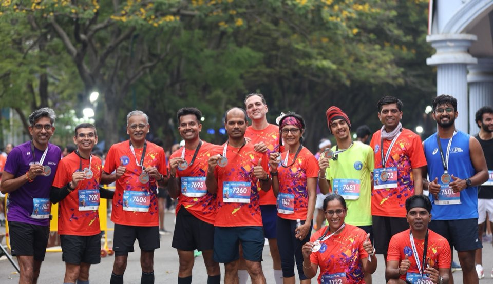 Runners celebrating after the Cubbon Classic finish